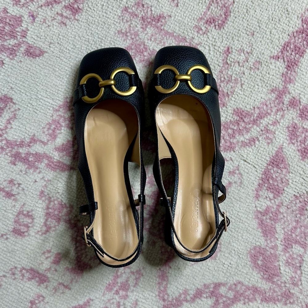 Slingback heels with gold adornment. Stylish and chic!